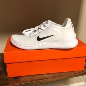white Nike tennis shoes
